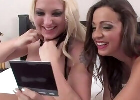 Busty ash-blonde with massive breasts lies on white sheets