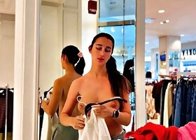 Busty Brunette Flashes in Store