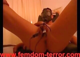 Slave Maskejoe is tort ured by the nurse at the gyne chair with el ectric shocks